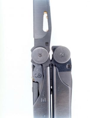 Blades: A Stainless Steel Letterman Wave 6 000 € / Finnish view - fragments of our time, 2002-2004, 155 x 125 cm, c-print diasec, signed, ed. 1/6 "A young woman wounded another woman in her stomach '03"